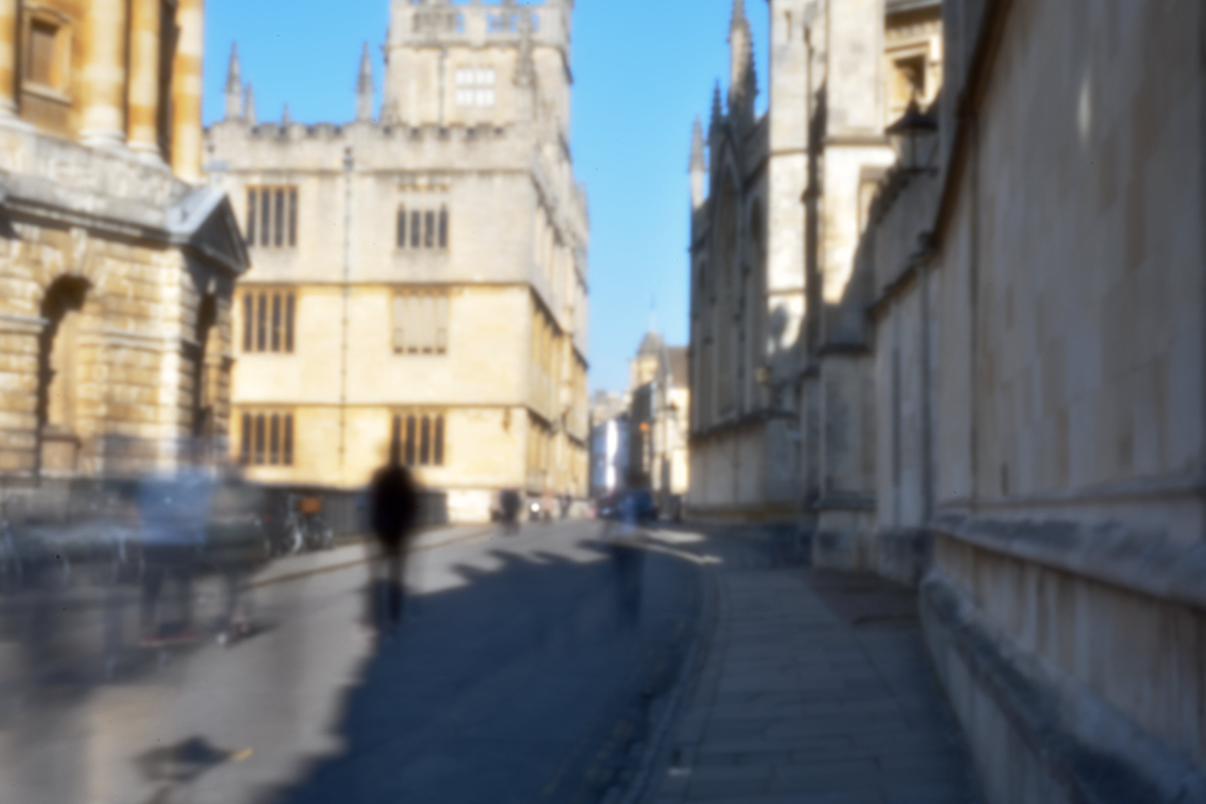 Tourists in Radcliffe Square. Even in bright sunlight (Oxford is seeing
unusually nice weather for February) I had to expose the image for 4 seconds at
ISO 100. Any motion thus appears blurred, so a tripod was a
necessity.
